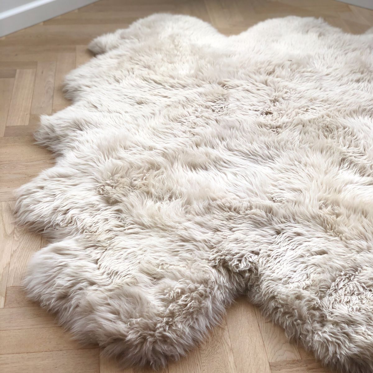 Fårskinnsmatta | Lång lugg | Nya Zealand | 180x162 cm Svart